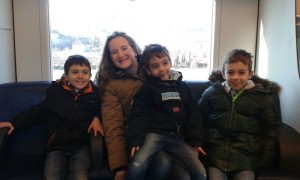The boys and I on the train on the way to Torino