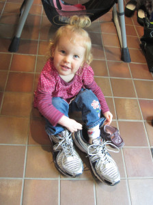 Kaylah keeps us laughing . . . she still loves putting on other people's shoes.