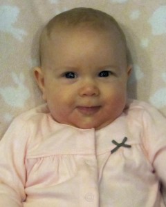 We tried and tried to get a 3 month old photo of her smiling but had a hard time. Here is one of the best we got. So sweet. It's amazing how much she looks like Joel did at the same age.